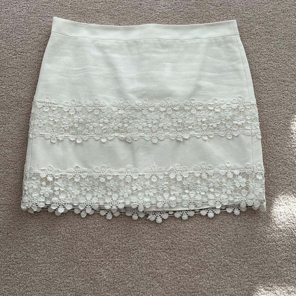 Jcrew lace skirt.  Zips up the back.